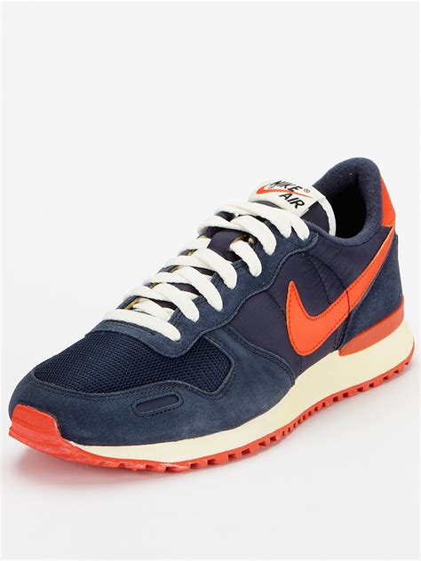 navy blue and orange sneakers.